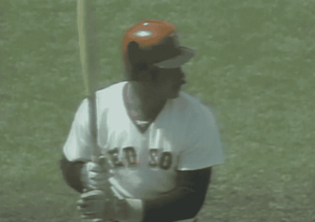 Jim Rice in action, showcasing his power as a key outfielder of the '80s.